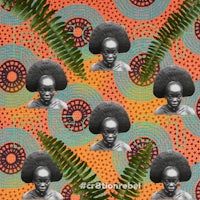 a photo of a woman with afro hair and ferns